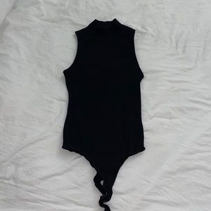 Plain Black sleeveless turtleneck body suit